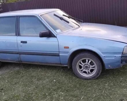 Синий Мазда 626, объемом двигателя 2 л и пробегом 405 тыс. км за 850 $, фото 1 на Automoto.ua