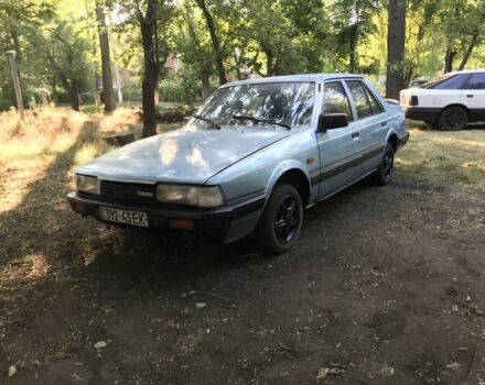 Синий Мазда 626, объемом двигателя 1.6 л и пробегом 333 тыс. км за 649 $, фото 1 на Automoto.ua