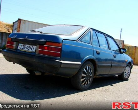 Синий Мазда 626, объемом двигателя 1.6 л и пробегом 340 тыс. км за 800 $, фото 1 на Automoto.ua