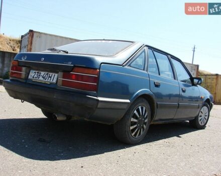 Синий Мазда 626, объемом двигателя 1.6 л и пробегом 340 тыс. км за 800 $, фото 1 на Automoto.ua