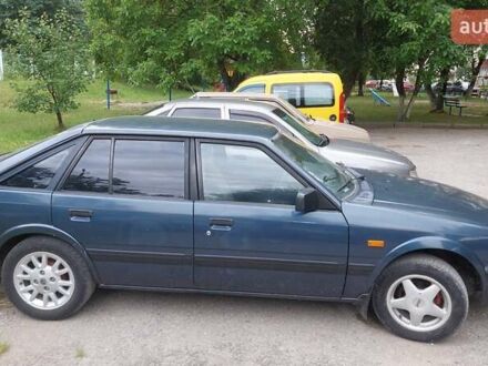 Синий Мазда 626, объемом двигателя 1.59 л и пробегом 309 тыс. км за 1200 $, фото 1 на Automoto.ua