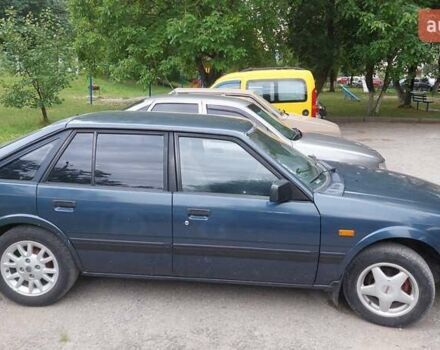 Синій Мазда 626, об'ємом двигуна 1.59 л та пробігом 309 тис. км за 1200 $, фото 1 на Automoto.ua