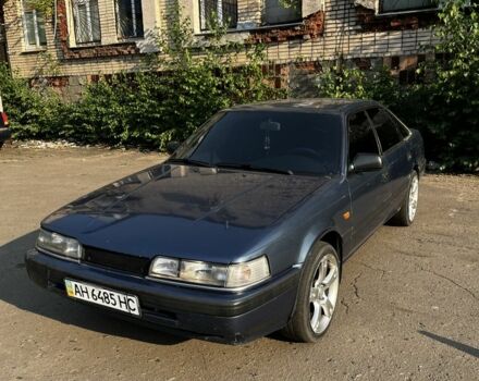 Синій Мазда 626, об'ємом двигуна 2 л та пробігом 320 тис. км за 1211 $, фото 1 на Automoto.ua