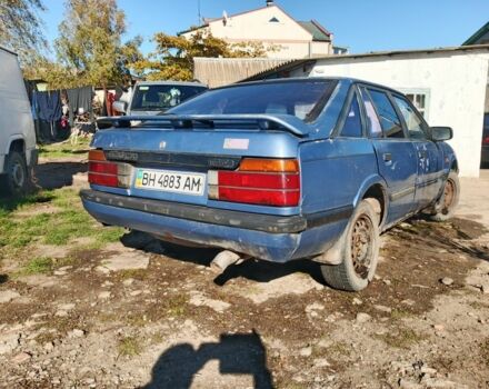 Синий Мазда 626, объемом двигателя 1.6 л и пробегом 100 тыс. км за 200 $, фото 1 на Automoto.ua