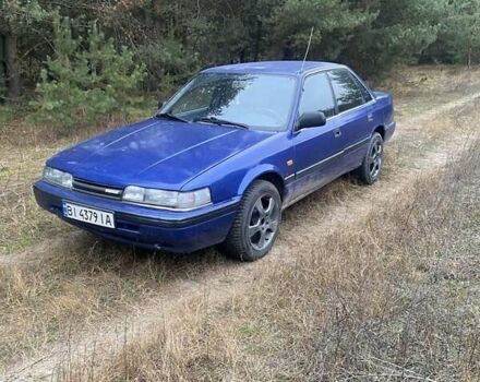 Синий Мазда 626, объемом двигателя 2.2 л и пробегом 335 тыс. км за 1650 $, фото 1 на Automoto.ua