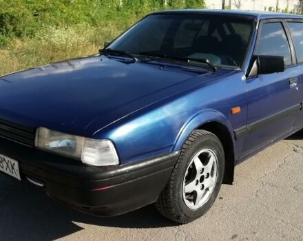 Синий Мазда 626, объемом двигателя 1.6 л и пробегом 500 тыс. км за 1300 $, фото 1 на Automoto.ua