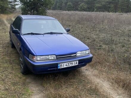 Синий Мазда 626, объемом двигателя 2.2 л и пробегом 335 тыс. км за 1650 $, фото 1 на Automoto.ua