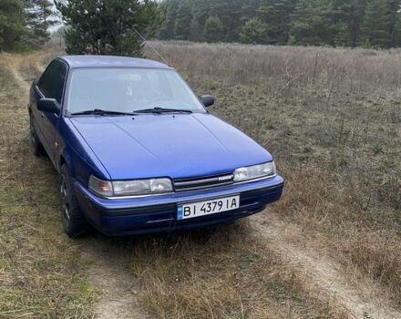 Синий Мазда 626, объемом двигателя 2.2 л и пробегом 335 тыс. км за 1650 $, фото 1 на Automoto.ua