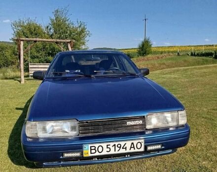 Синий Мазда 626, объемом двигателя 2 л и пробегом 600 тыс. км за 900 $, фото 1 на Automoto.ua