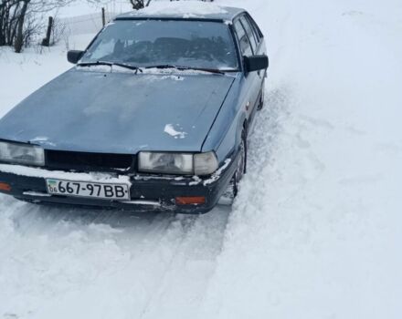 Синий Мазда 626, объемом двигателя 2 л и пробегом 300 тыс. км за 499 $, фото 1 на Automoto.ua