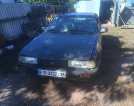 Синій Мазда 626, об'ємом двигуна 2 л та пробігом 220 тис. км за 602 $, фото 1 на Automoto.ua