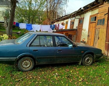 Синий Мазда 626, объемом двигателя 1.6 л и пробегом 380 тыс. км за 300 $, фото 1 на Automoto.ua