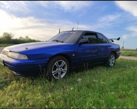 Синій Мазда 626, об'ємом двигуна 2.2 л та пробігом 200 тис. км за 2000 $, фото 1 на Automoto.ua