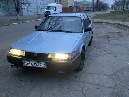 Мазда 626 1987 в Николаеве на Automoto.ua Синий Мазда 626, объемом двигателя 1.8 л и пробегом 400 тыс. км за 892 $, фото 1 на Automoto.ua