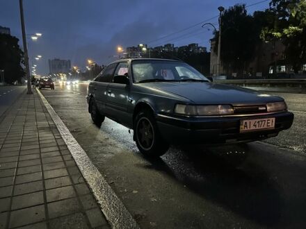 Синий Мазда 626, объемом двигателя 2.2 л и пробегом 333 тыс. км за 1350 $, фото 1 на Automoto.ua