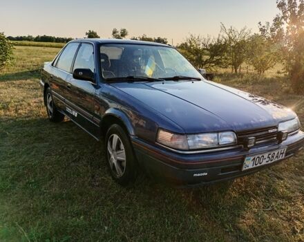 Синий Мазда 626, объемом двигателя 2 л и пробегом 200 тыс. км за 783 $, фото 1 на Automoto.ua