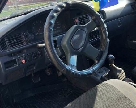 Синий Мазда 626, объемом двигателя 2 л и пробегом 451 тыс. км за 900 $, фото 1 на Automoto.ua