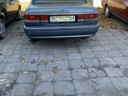 Синий Мазда 626, объемом двигателя 2 л и пробегом 250 тыс. км за 800 $, фото 1 на Automoto.ua