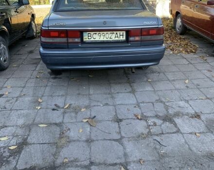 Синий Мазда 626, объемом двигателя 2 л и пробегом 250 тыс. км за 800 $, фото 1 на Automoto.ua