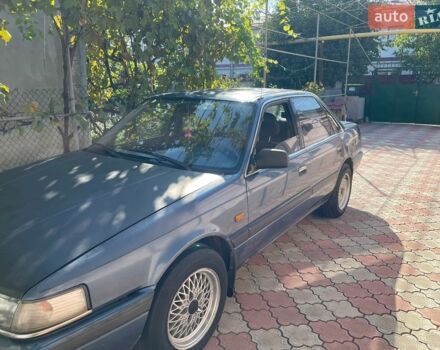 Синий Мазда 626, объемом двигателя 2 л и пробегом 385 тыс. км за 1000 $, фото 1 на Automoto.ua