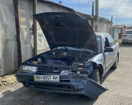 Синий Мазда 626, объемом двигателя 1.8 л и пробегом 150 тыс. км за 650 $, фото 1 на Automoto.ua