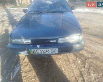 Синий Мазда 626, объемом двигателя 2 л и пробегом 410 тыс. км за 900 $, фото 1 на Automoto.ua