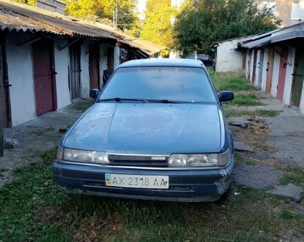 Синий Мазда 626, объемом двигателя 2 л и пробегом 10 тыс. км за 466 $, фото 1 на Automoto.ua