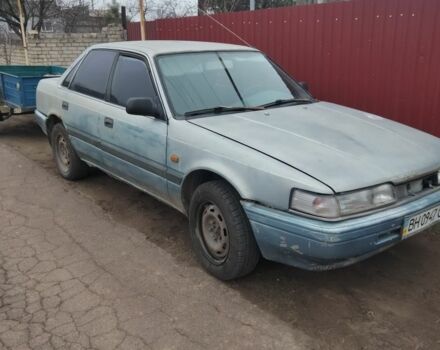 Синий Мазда 626, объемом двигателя 0 л и пробегом 400 тыс. км за 700 $, фото 1 на Automoto.ua