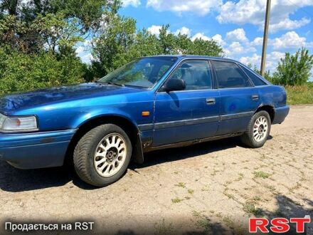 Синій Мазда 626, об'ємом двигуна 2 л та пробігом 98 тис. км за 700 $, фото 1 на Automoto.ua