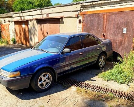 Синий Мазда 626, объемом двигателя 1.8 л и пробегом 1000 тыс. км за 950 $, фото 1 на Automoto.ua