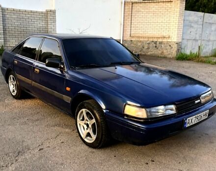 Синий Мазда 626, объемом двигателя 2 л и пробегом 200 тыс. км за 950 $, фото 1 на Automoto.ua