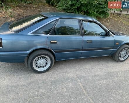 Синий Мазда 626, объемом двигателя 2 л и пробегом 400 тыс. км за 1000 $, фото 1 на Automoto.ua
