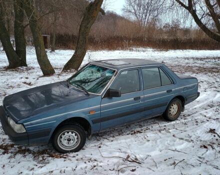 Синій Мазда 626, об'ємом двигуна 2 л та пробігом 300 тис. км за 926 $, фото 1 на Automoto.ua