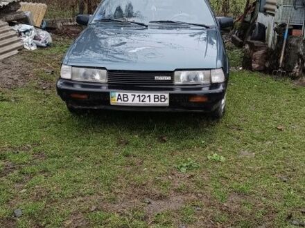 Синий Мазда 626, объемом двигателя 2 л и пробегом 205 тыс. км за 600 $, фото 1 на Automoto.ua