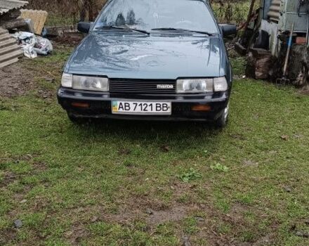 Синий Мазда 626, объемом двигателя 2 л и пробегом 205 тыс. км за 600 $, фото 1 на Automoto.ua