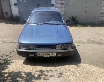 Синий Мазда 626, объемом двигателя 2 л и пробегом 440 тыс. км за 1700 $, фото 1 на Automoto.ua
