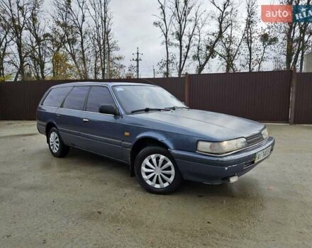 Синий Мазда 626, объемом двигателя 2 л и пробегом 502 тыс. км за 1100 $, фото 1 на Automoto.ua