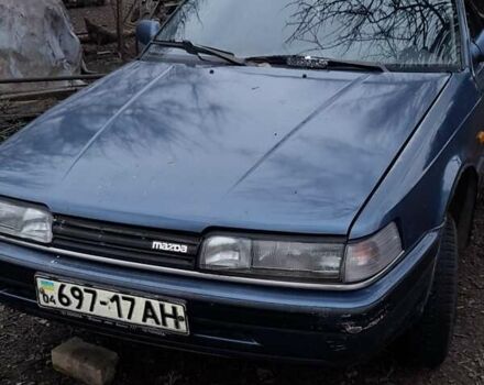 Синий Мазда 626, объемом двигателя 2.2 л и пробегом 350 тыс. км за 750 $, фото 1 на Automoto.ua