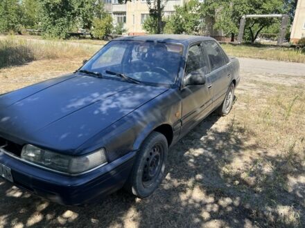 Синій Мазда 626, об'ємом двигуна 2 л та пробігом 230 тис. км за 798 $, фото 1 на Automoto.ua