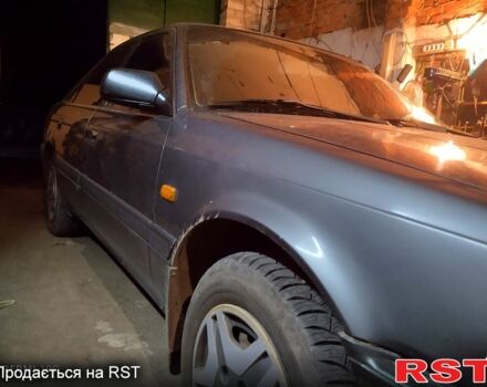 Синий Мазда 626, объемом двигателя 2 л и пробегом 340 тыс. км за 2000 $, фото 1 на Automoto.ua