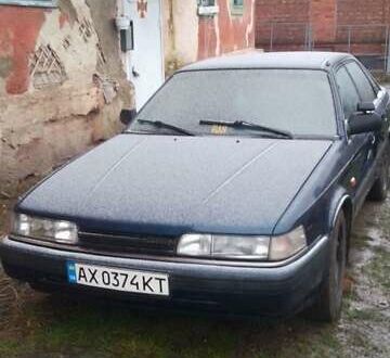 Синий Мазда 626, объемом двигателя 2 л и пробегом 60 тыс. км за 1100 $, фото 1 на Automoto.ua