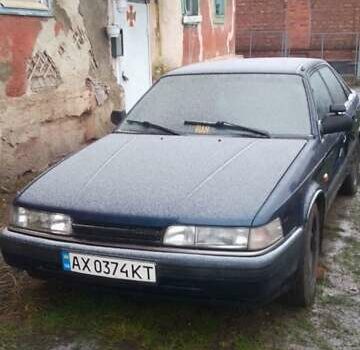 Синий Мазда 626, объемом двигателя 2 л и пробегом 55 тыс. км за 1500 $, фото 1 на Automoto.ua