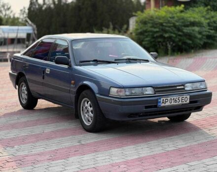 Синий Мазда 626, объемом двигателя 2 л и пробегом 250 тыс. км за 1350 $, фото 1 на Automoto.ua
