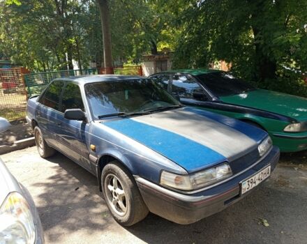 Синий Мазда 626, объемом двигателя 1.8 л и пробегом 1 тыс. км за 950 $, фото 1 на Automoto.ua