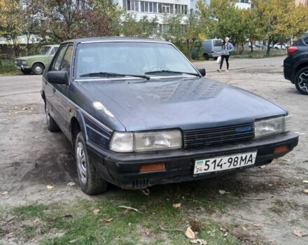 Синий Мазда 626, объемом двигателя 2 л и пробегом 292 тыс. км за 500 $, фото 1 на Automoto.ua