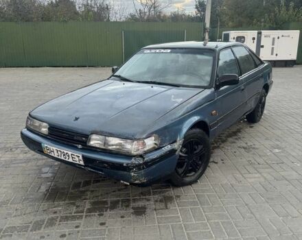 Синій Мазда 626, об'ємом двигуна 2 л та пробігом 999 тис. км за 600 $, фото 1 на Automoto.ua