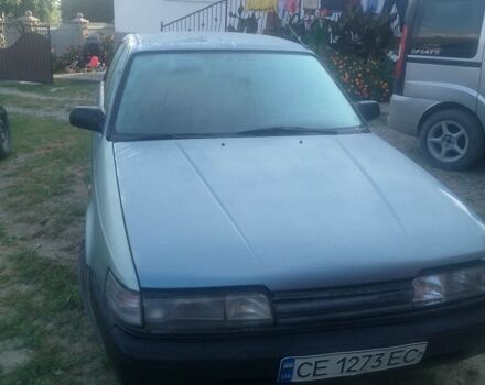 Синий Мазда 626, объемом двигателя 1.8 л и пробегом 20 тыс. км за 650 $, фото 1 на Automoto.ua