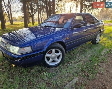 Синий Мазда 626, объемом двигателя 2 л и пробегом 308 тыс. км за 1700 $, фото 1 на Automoto.ua