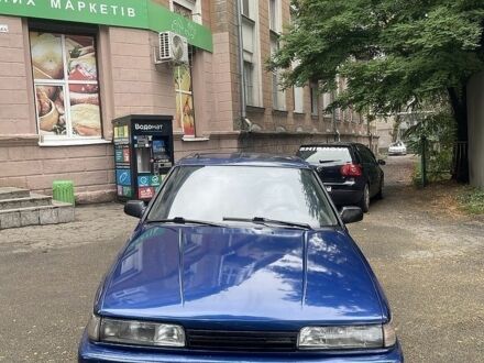 Синий Мазда 626, объемом двигателя 2 л и пробегом 400 тыс. км за 1098 $, фото 1 на Automoto.ua