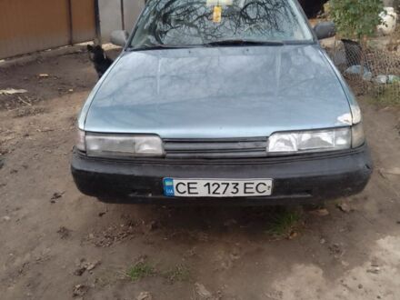 Синий Мазда 626, объемом двигателя 1.8 л и пробегом 1 тыс. км за 700 $, фото 1 на Automoto.ua